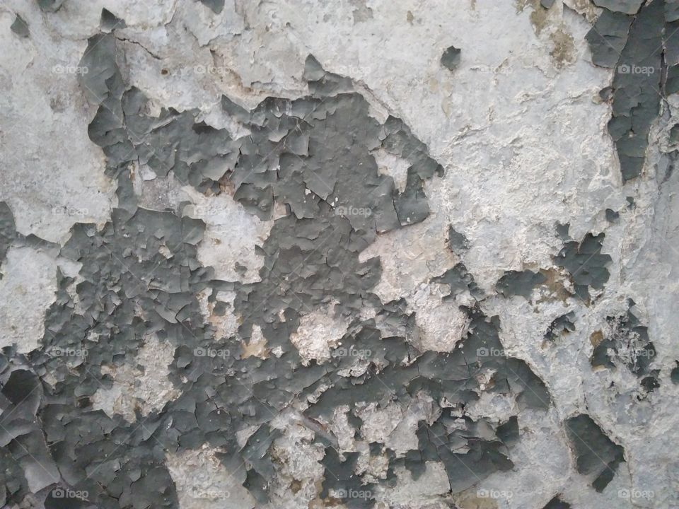 old peeling paint on the wall