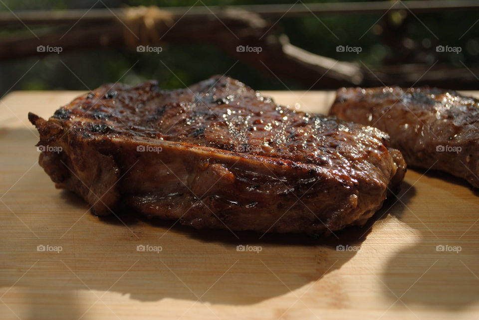 steak on wooden board