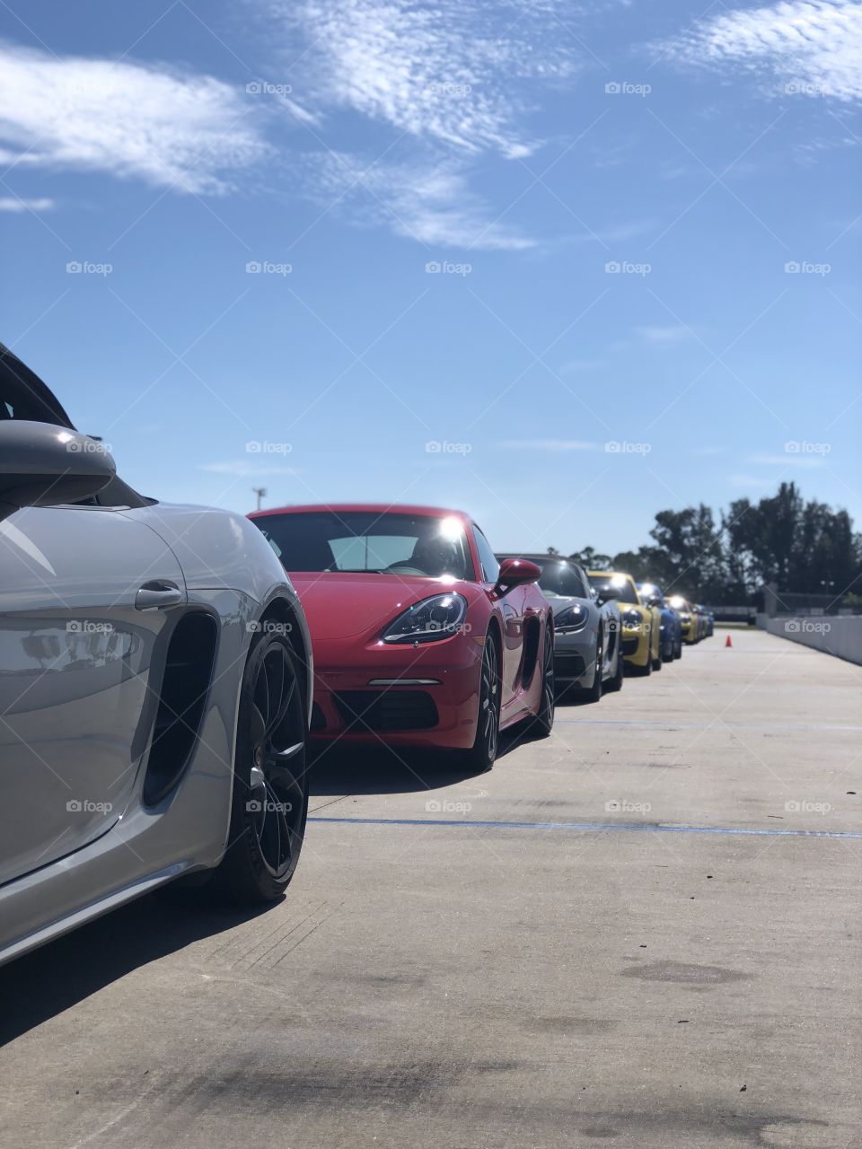 A line of Porsches