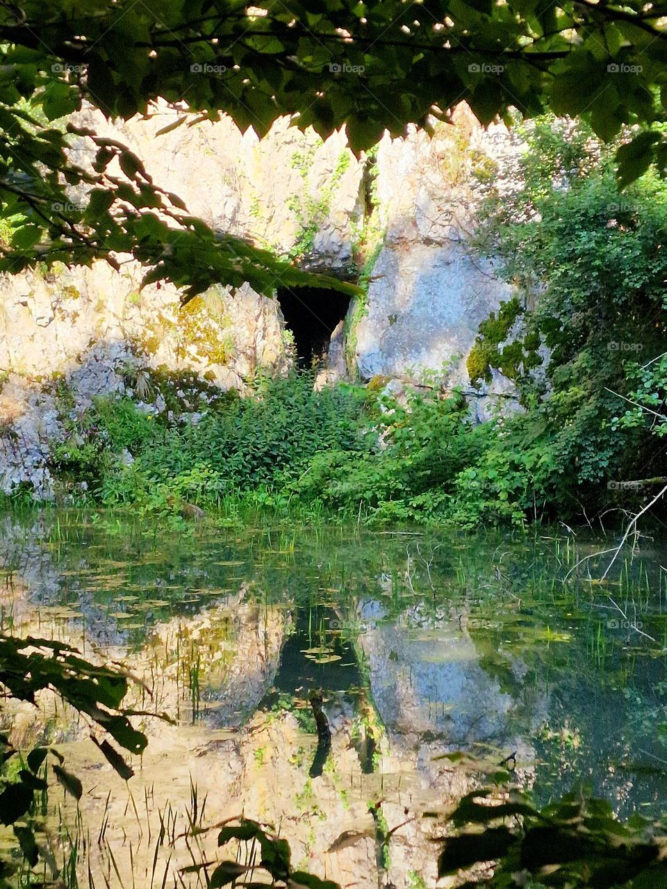 the reflection of the mountain in the water