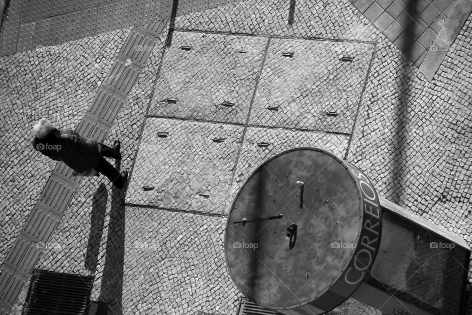 Walking along the sidewalks of the city of Lisbon