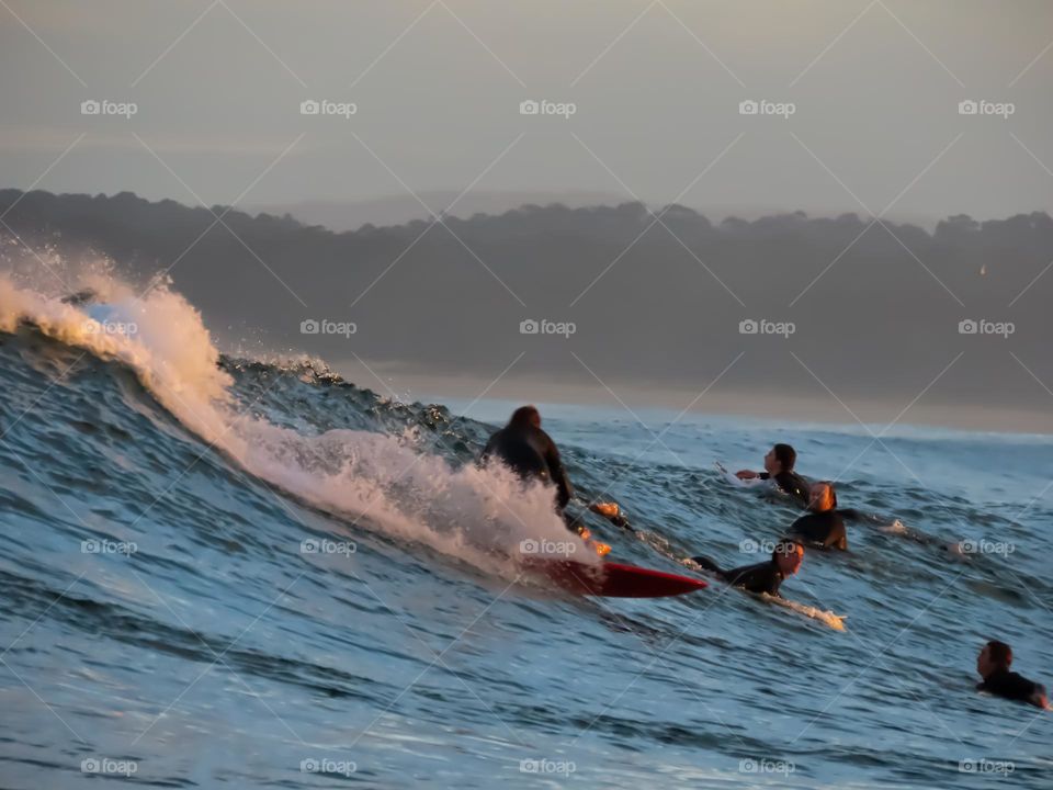 Sunset surfing