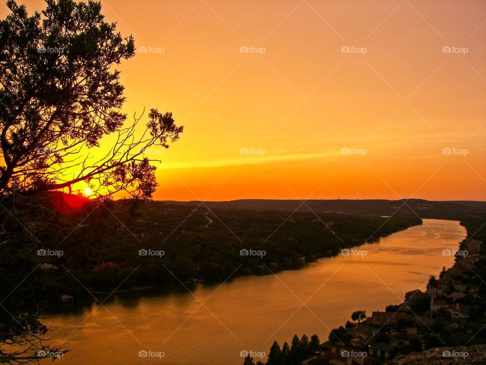 Scenic view of river during sunset