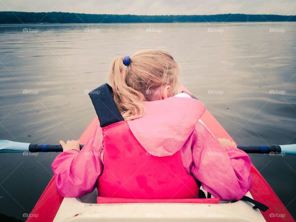 Little girl in a kayak