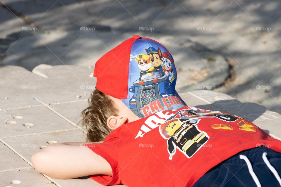 Enjoying shade of hat