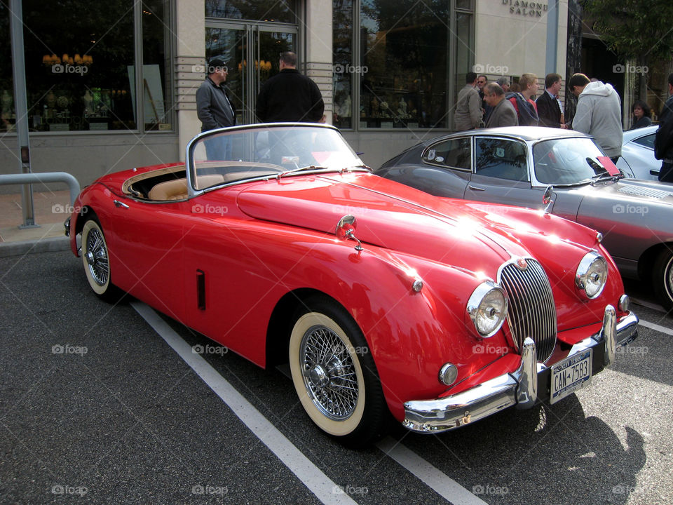 red classic jaguar roadster by vincentm