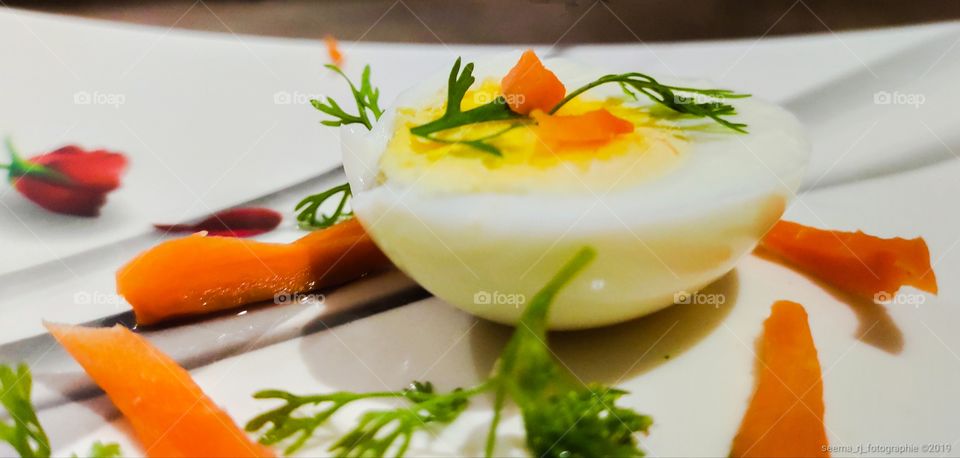 Nutritious healthy boiled egg with carrots