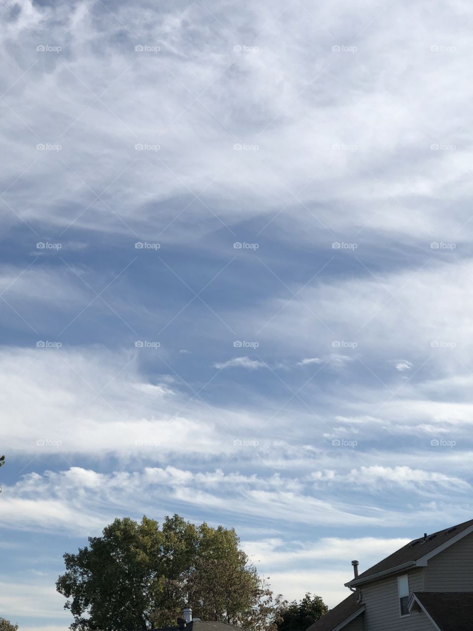 A lovely blue sky with soft white clouds