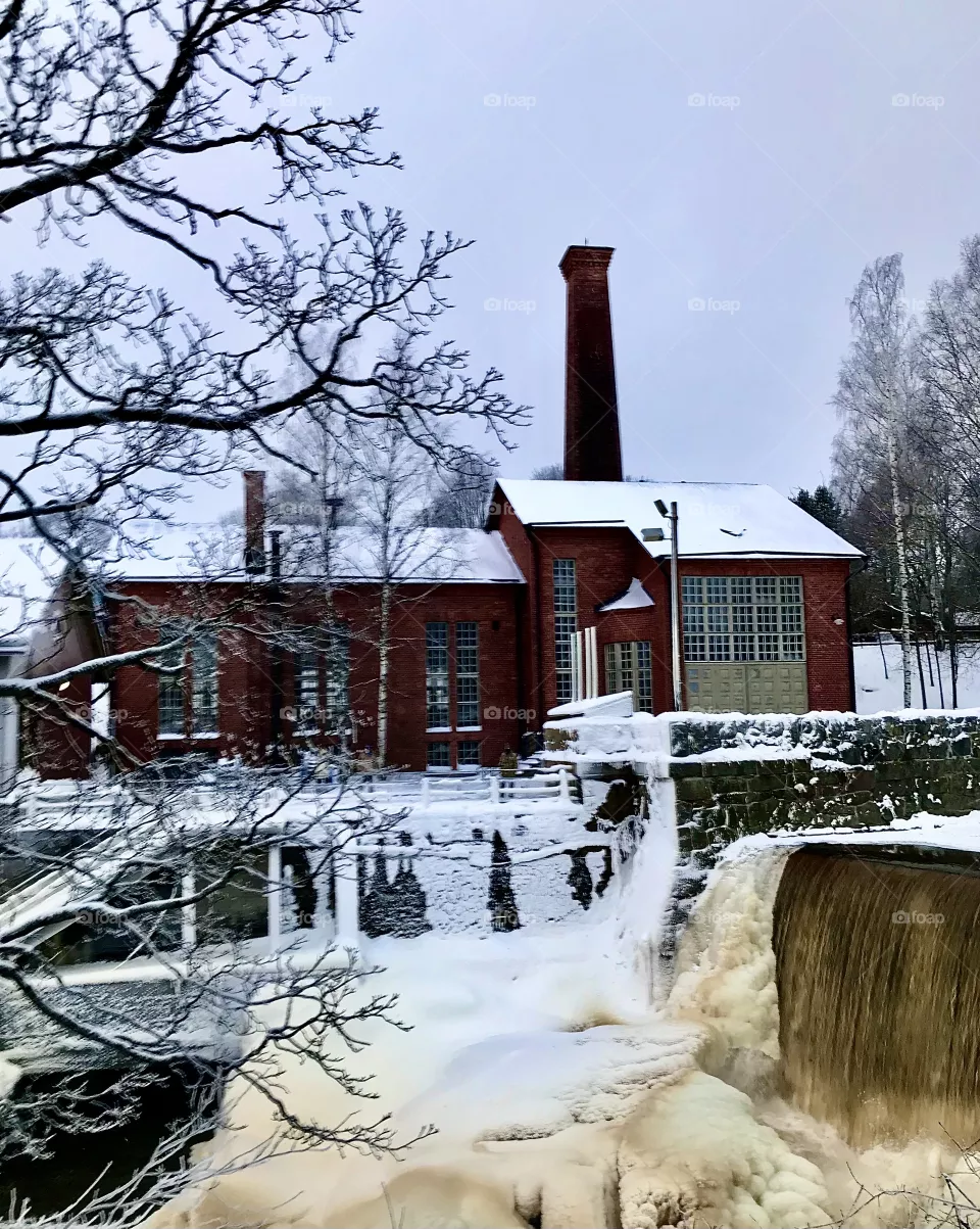 Old hydropower plant at Vanhankaupunginkoski rapids, Old town Helsinki, Finland.
