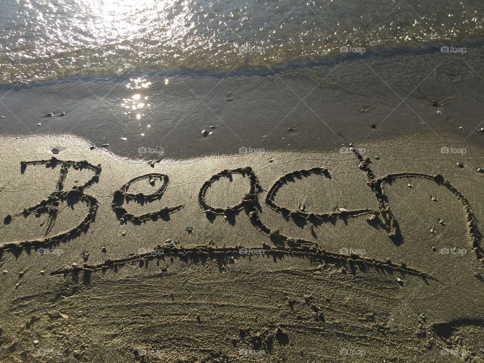 Write my name in the sand