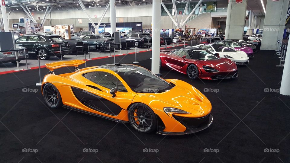 A line up of new McLaren Supercars at an Auto Show