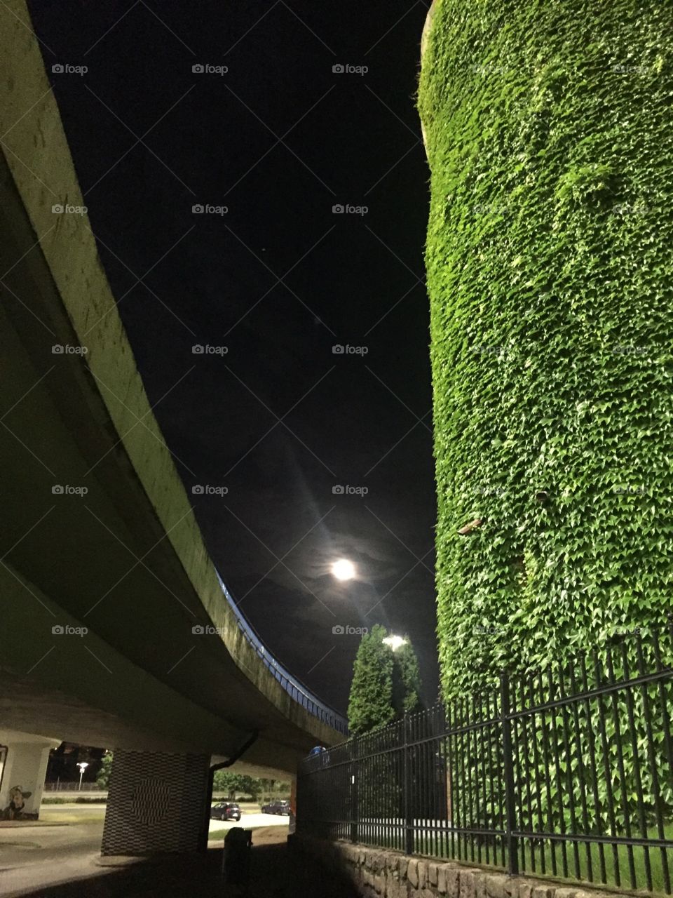 Moon between a building and a ramp