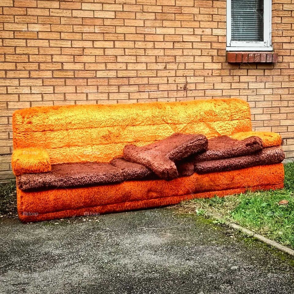 Ugly shaggy sofa, seen better days