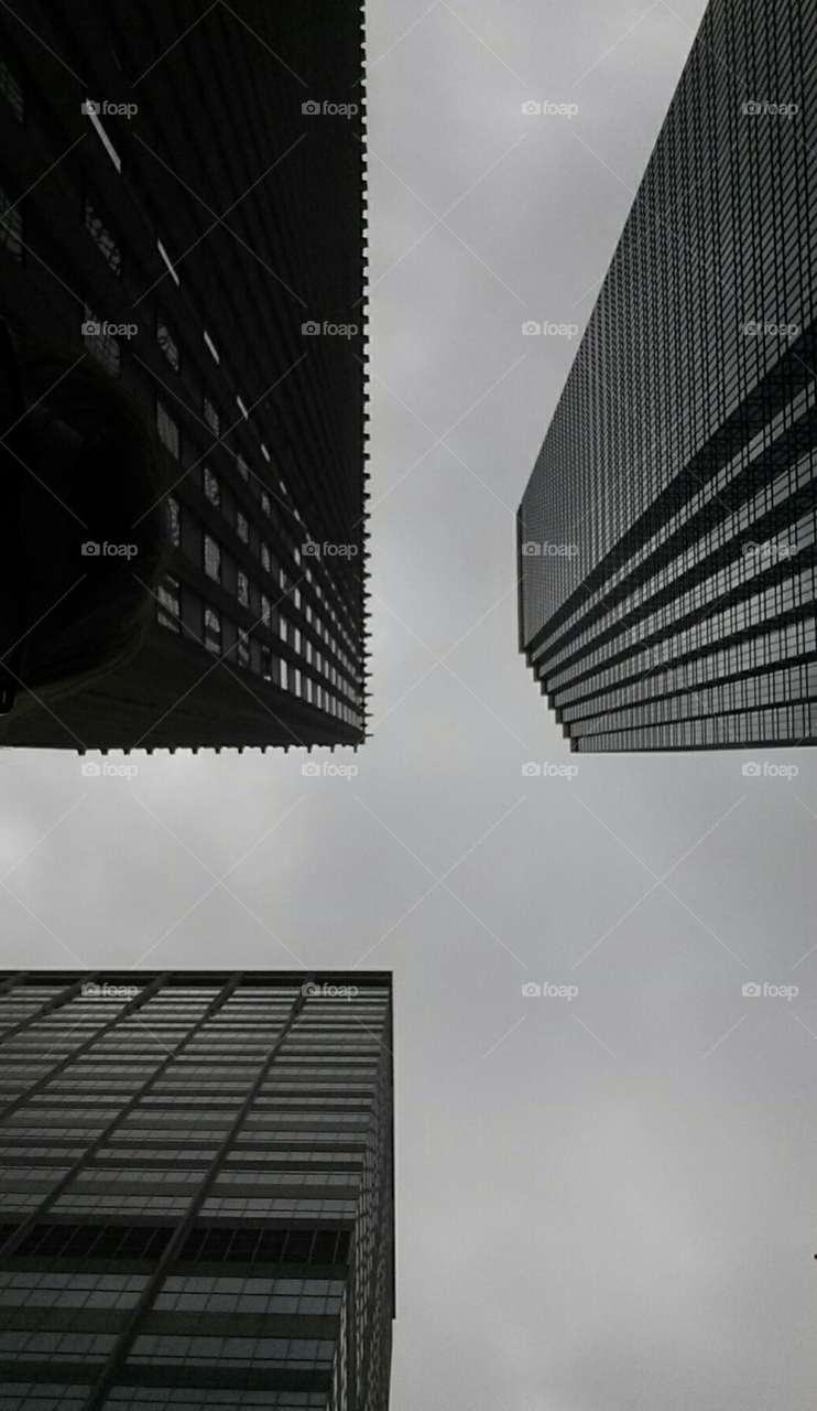 looking up at a crown. looking up at three buildings in downtown Minneapolis