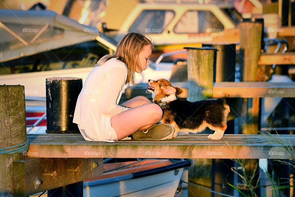 Friends. Girl and her puppy