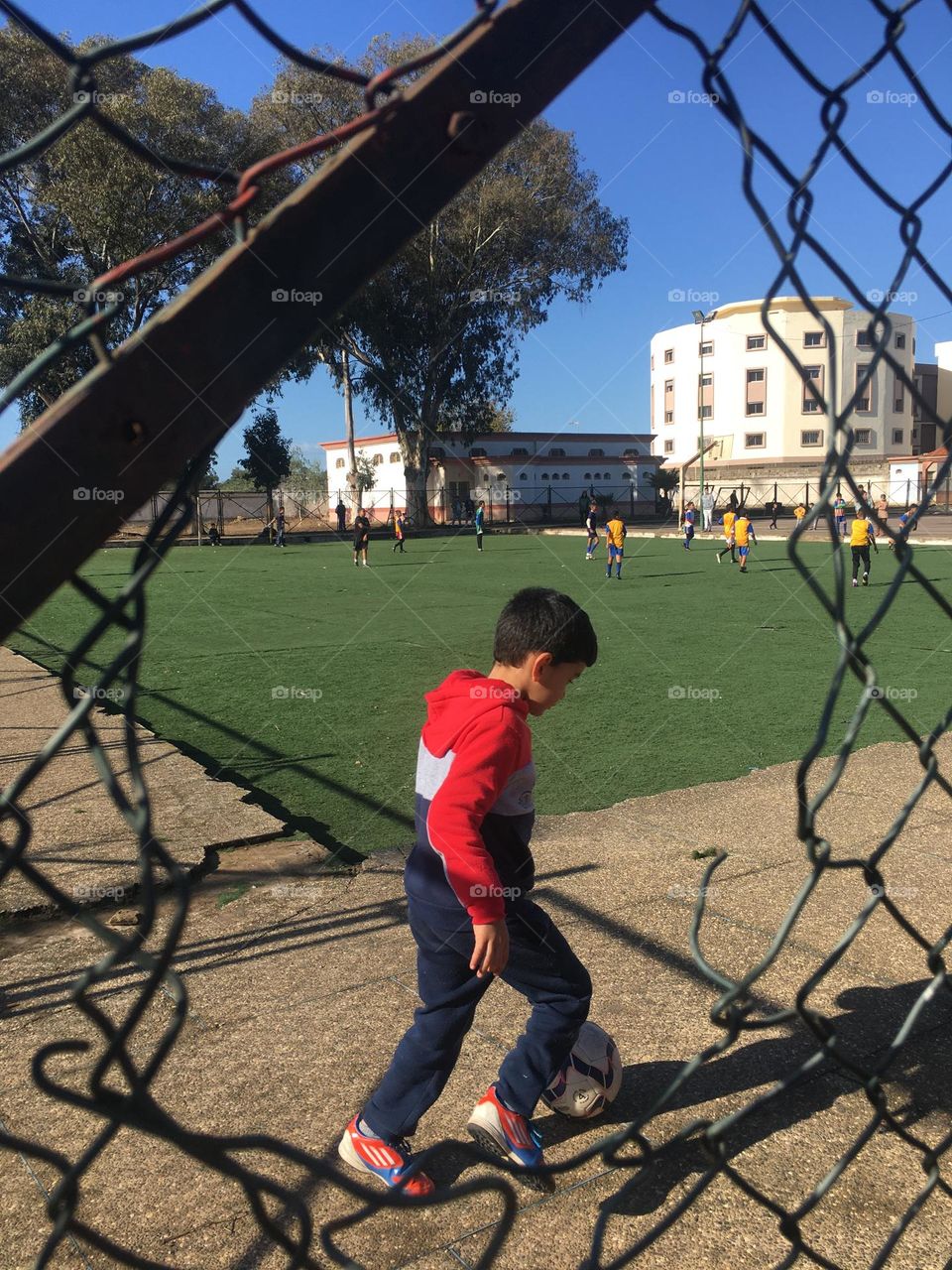 Kid playing soccer game 