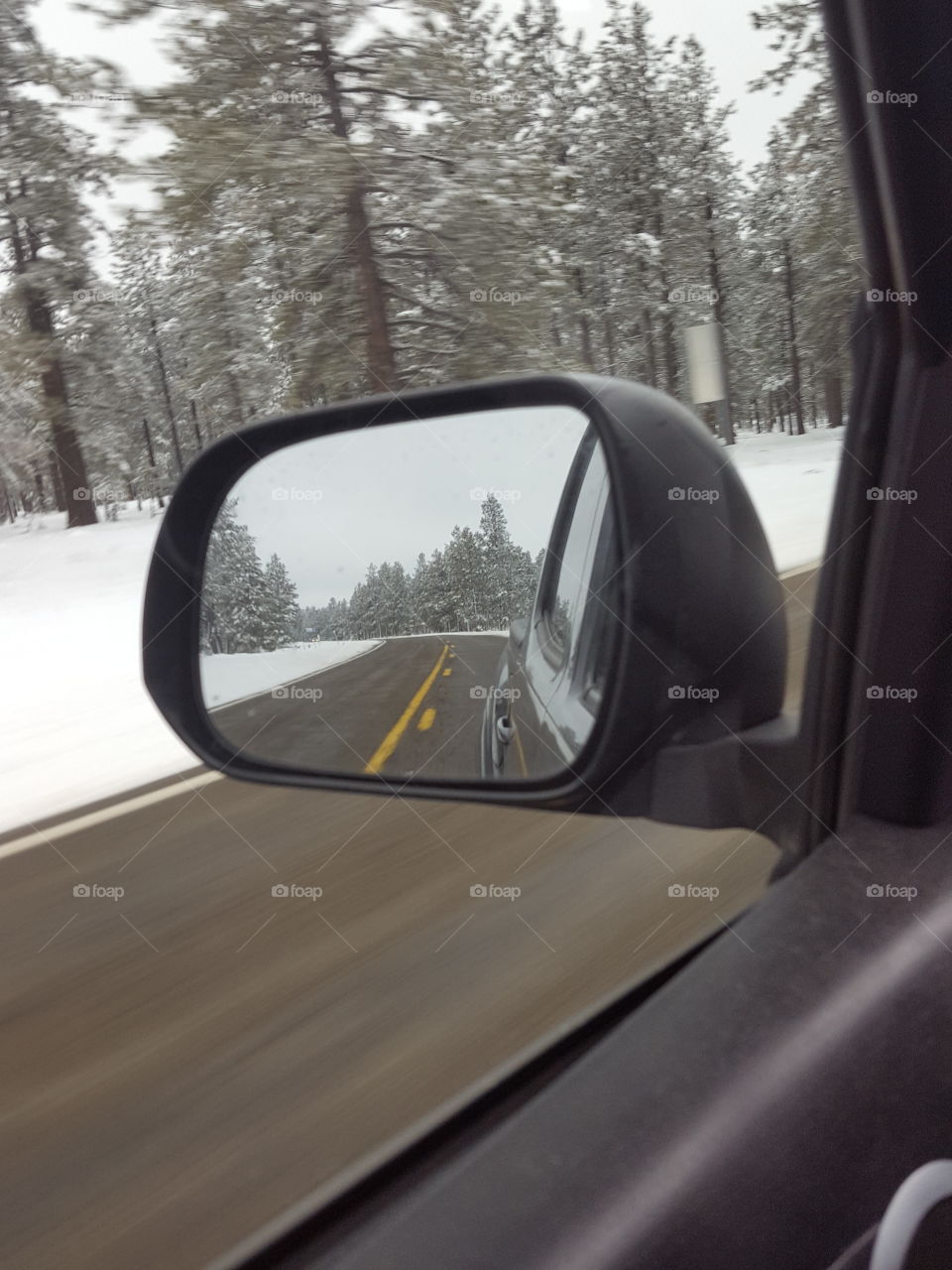 winter rearview reflection