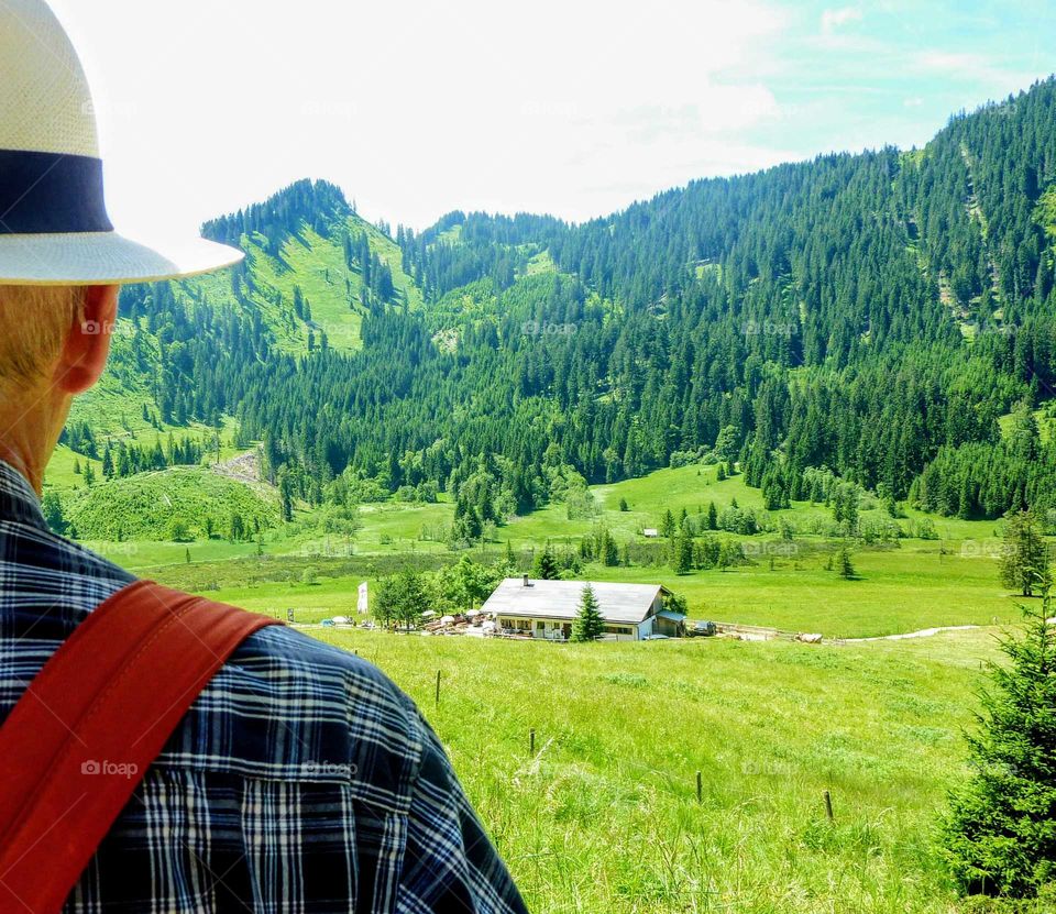 hiking. Looking down in the valley and up to the Mountains