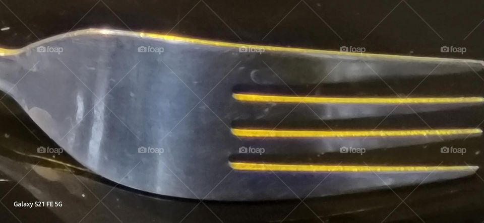 yellow light illuminated fork