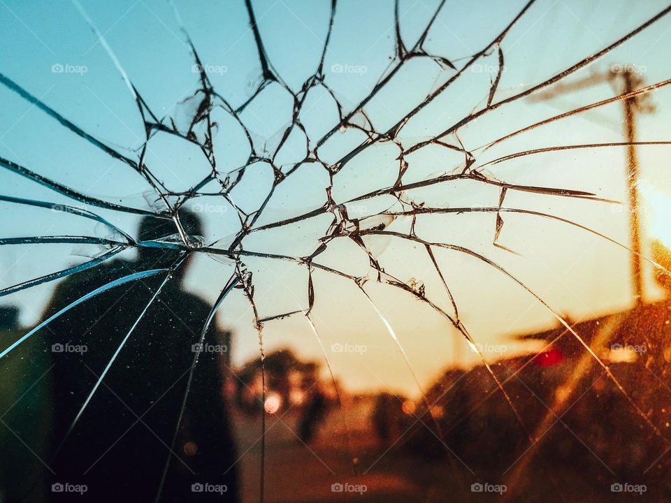 Close-up of a cracked car windscreen