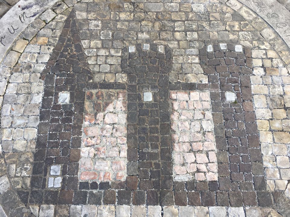 Street stone mosaic. Moresco, beautiful medieval village, street stone mosaic closeup, Marche region, Italy