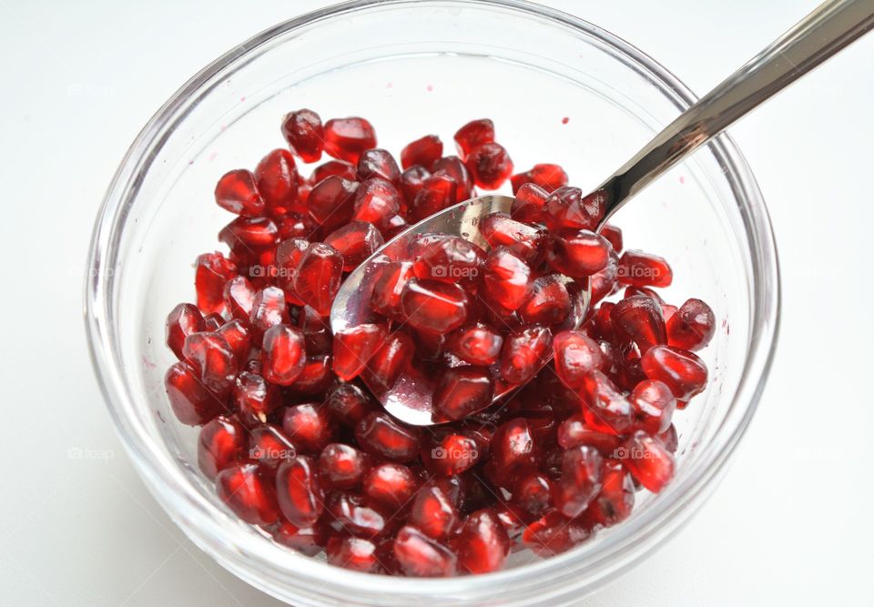 pomegranate seeds on a plate fresh healthy vegetarian food eating home