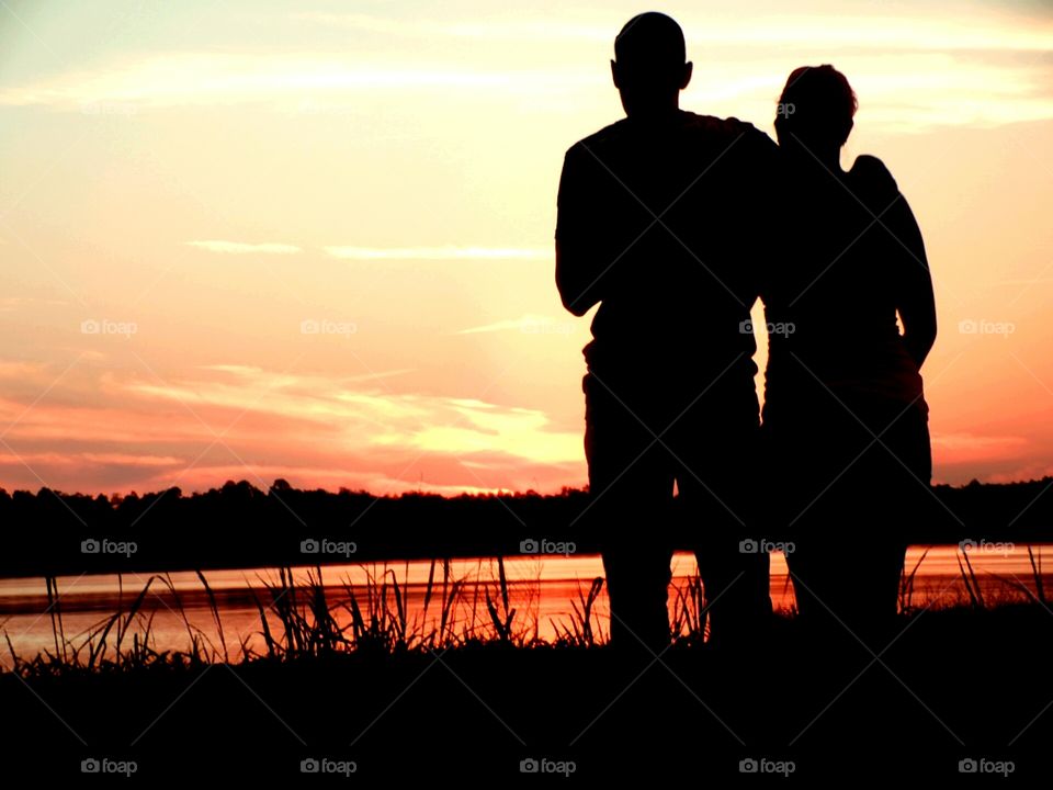 sunset. couple viewing sunset