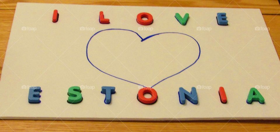 handmade sign with different colored letters