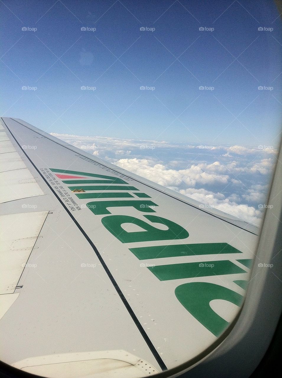 View over the sky and the airplane wing