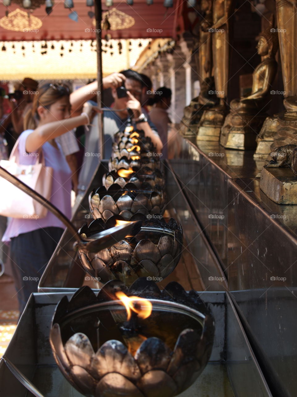 Oil Candles at a temple, Thailand