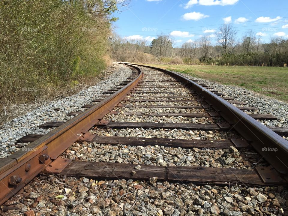 Railroad track in a meadow