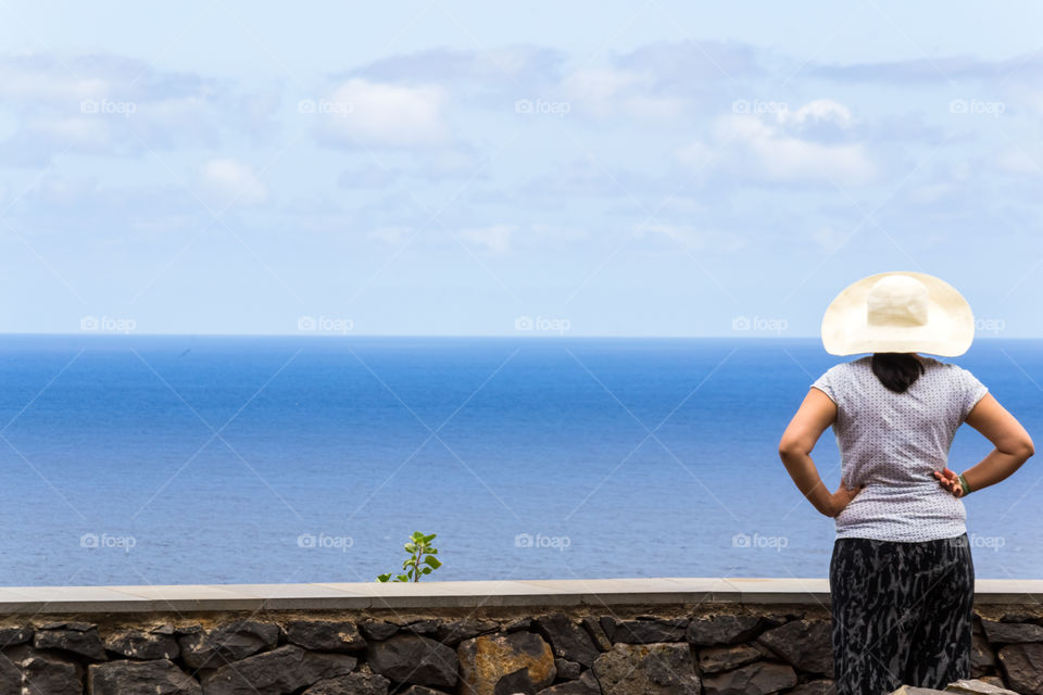 Watching the sea. Woman watching the sea