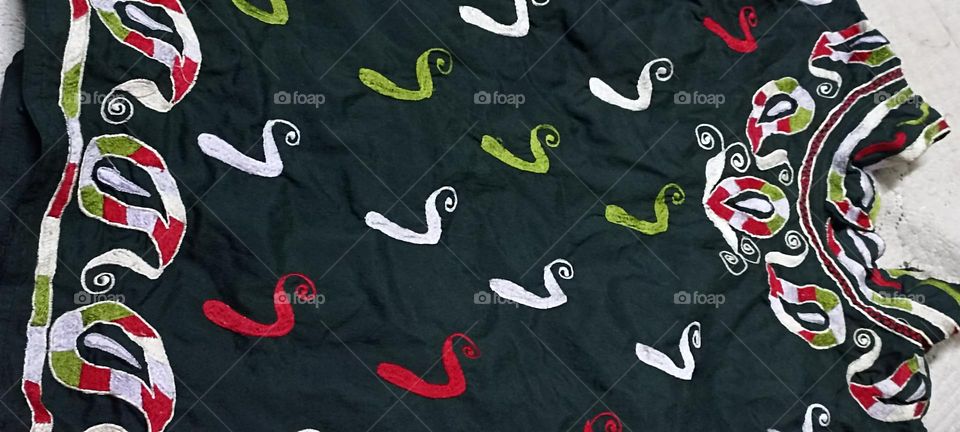 embroidery works on top of my mom's sari piece later stitched for me top that can be used with many dresses.