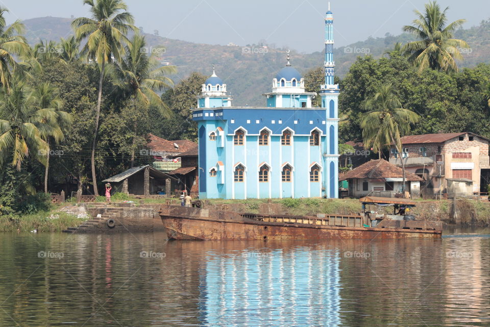This is mosque,built on river bank in India. This place not only pleases the viewers eyes but also to the soul of viewers as it's built in nature's protection.
