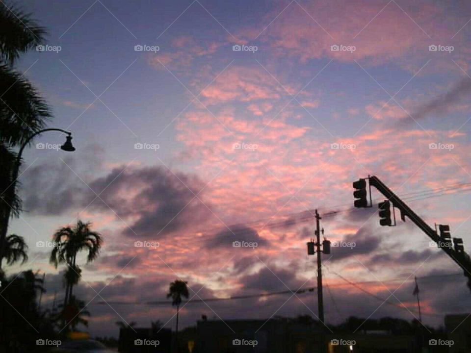 Sunset, clouds, orange st, palm trees