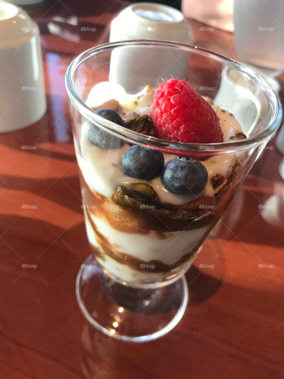 Morning breakfast parfait with yogurt nuts and fruit