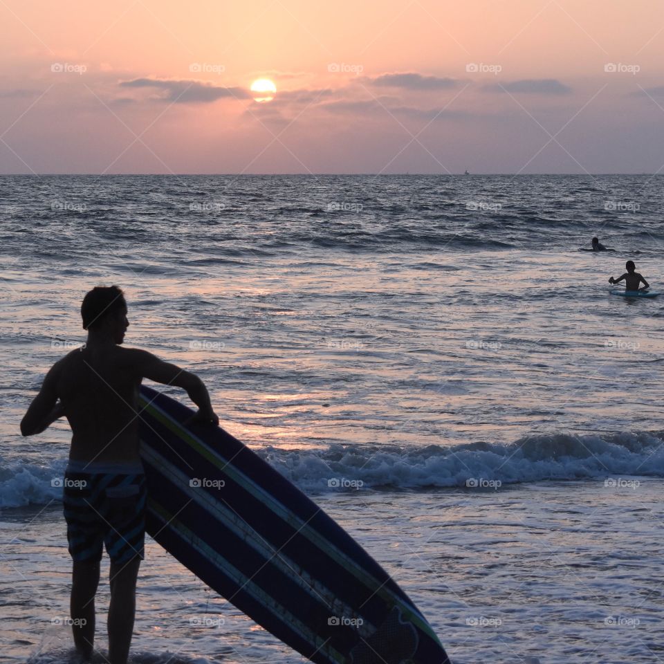 California Indian Summer sunset surfing. The crowds are gone and the locals have the beaches and waves to themselves.