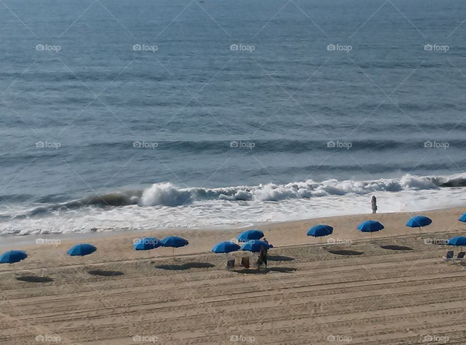 Blue Umbrellas. View from Hilton Suites, Ocean City, Maryland