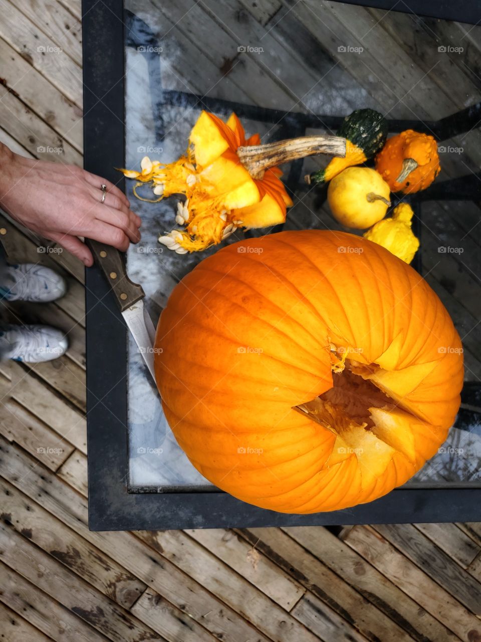 From where I stand;
Pumpkin carving