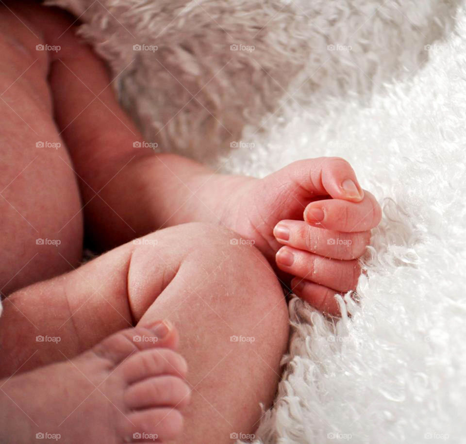 newborn. Adorable newborn cuddles for their first photo shoot