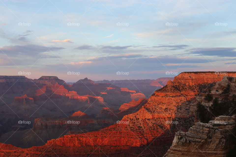 Gorgeous sunset at Grand Canyon that really brought out the reds in the rock. 