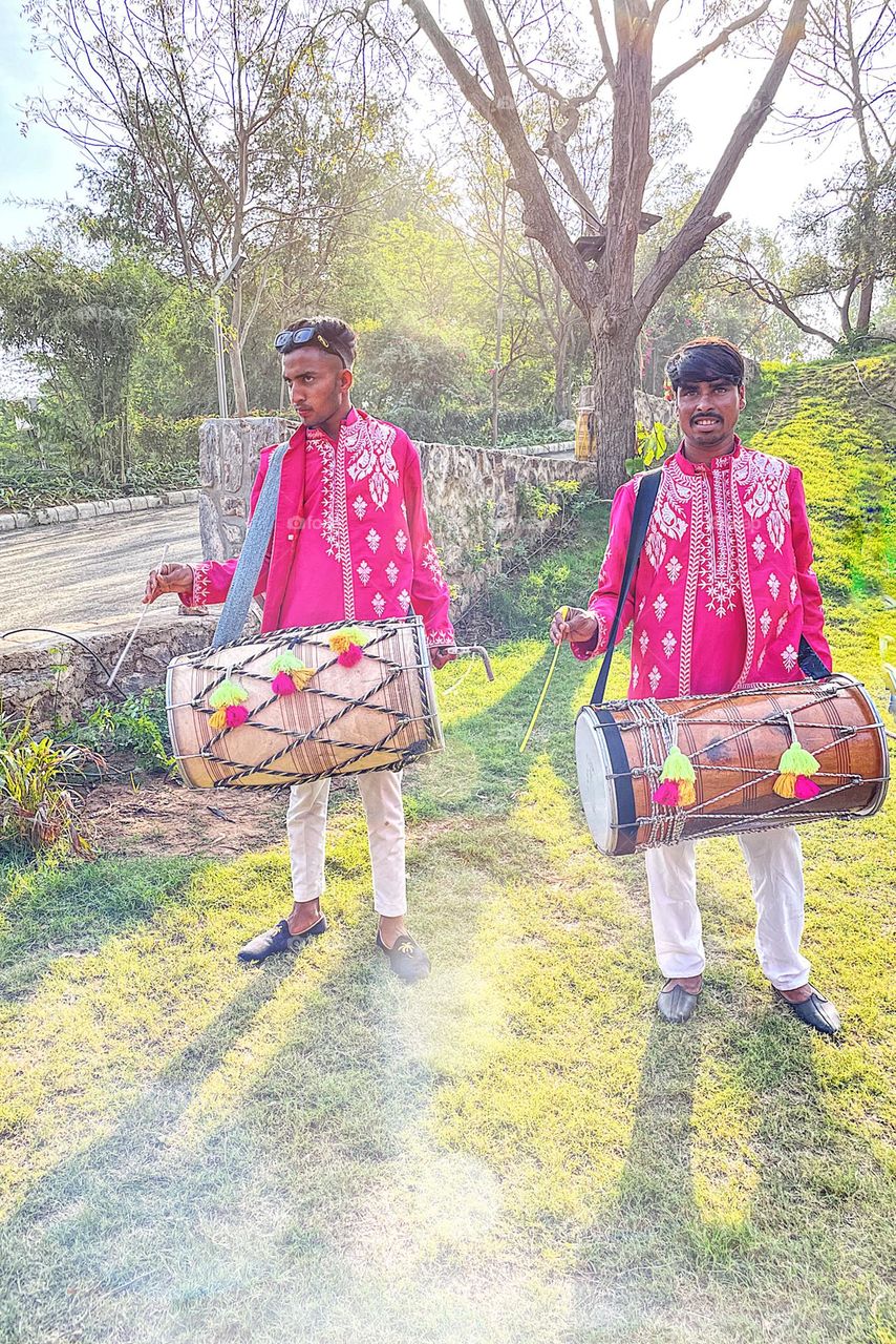 Fathers playing drums, fathers at wedding, colorful fathers, fathers in India