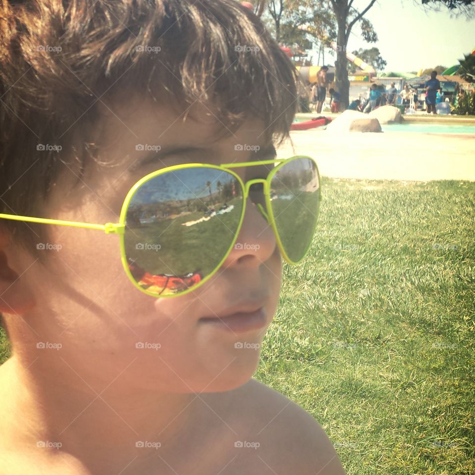 trendy boy. This was at a water park. My son wanted to look cool.