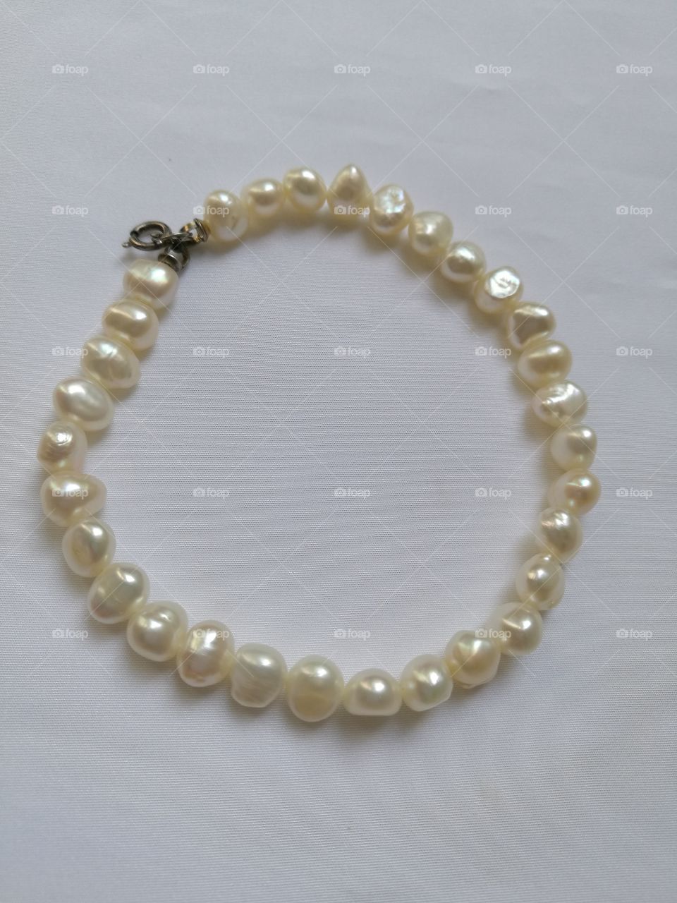 pearl bracelet on white background.