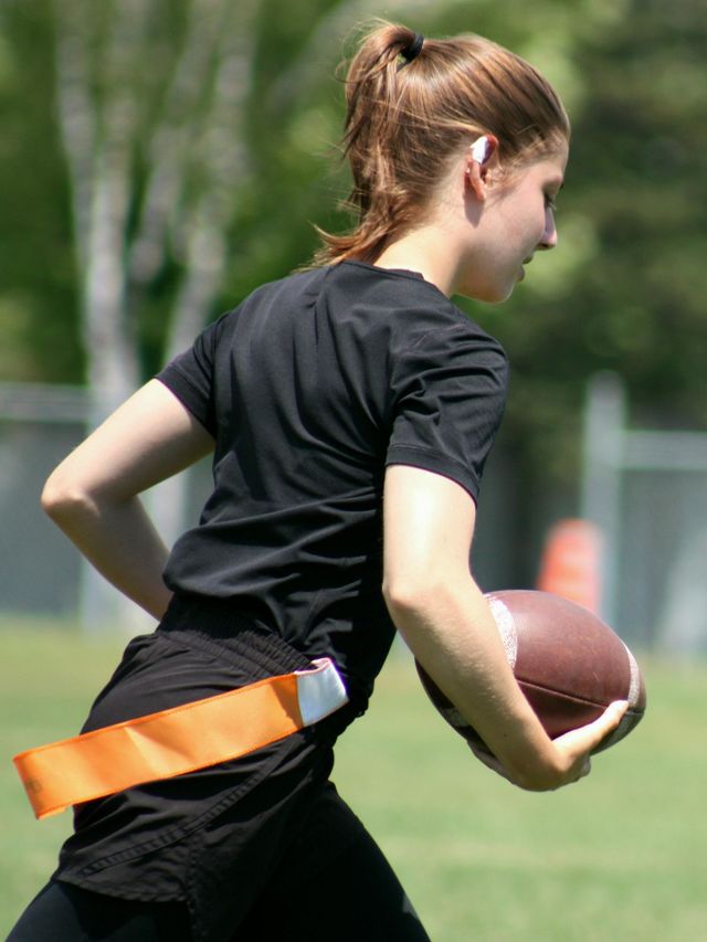 Girl playing football