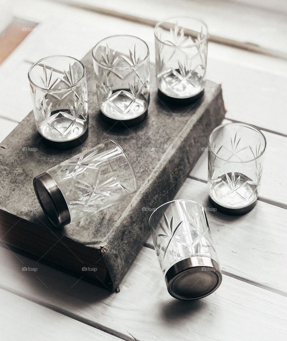 Antique crystal glasses set with metal bottom