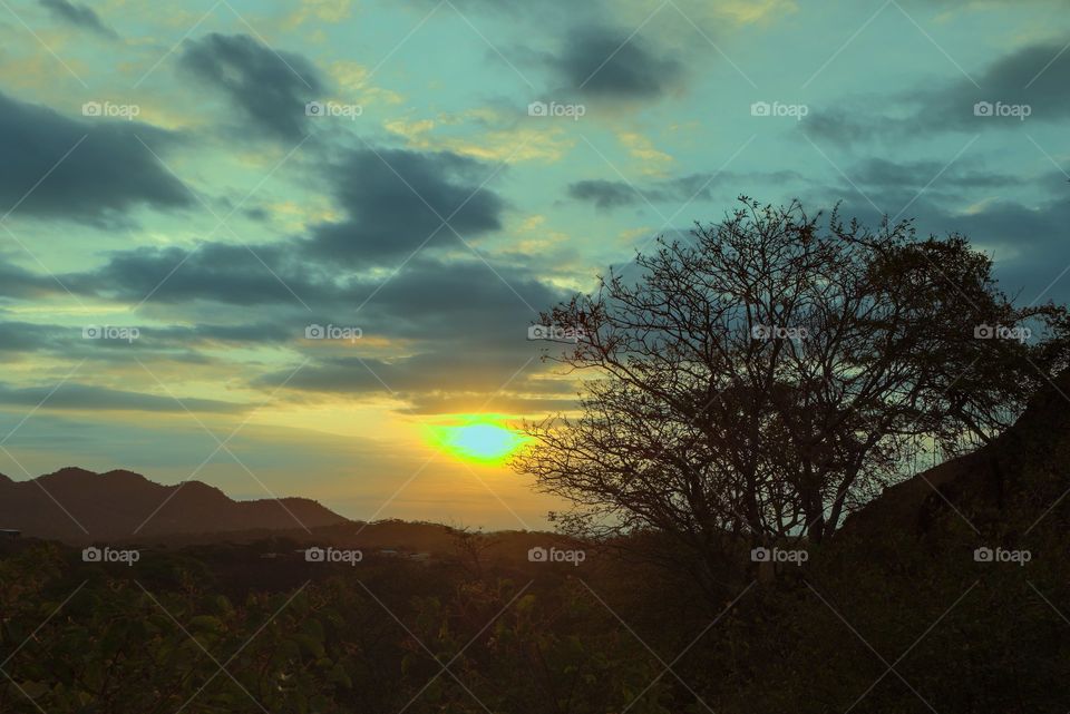 Blue sunset with dense clouds in the countryside