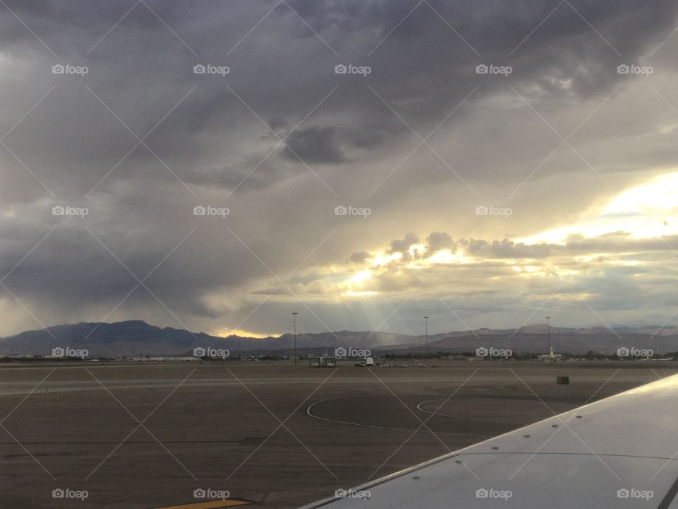 Sun through clouds out airplane