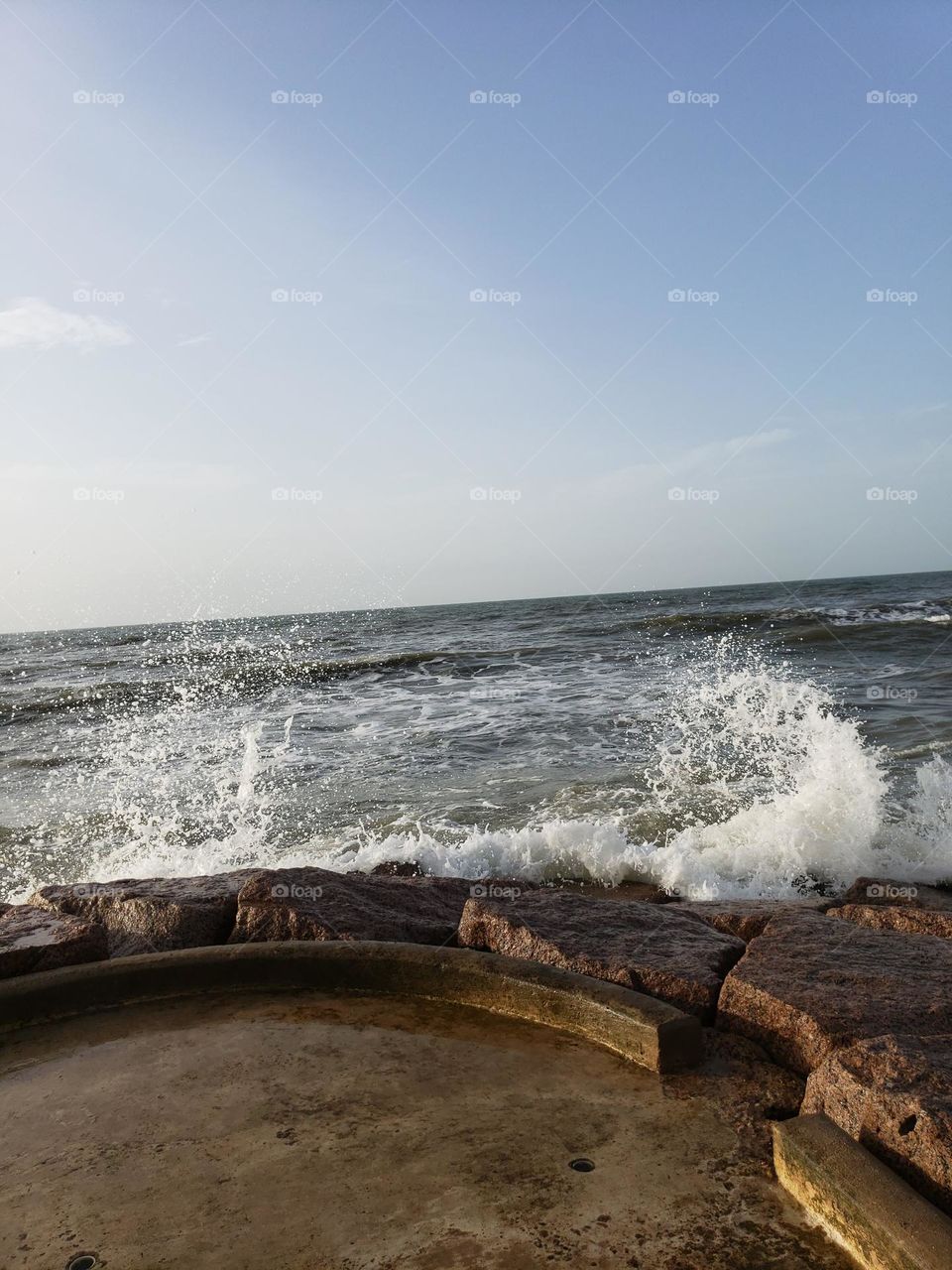 Waves splashing the jetty