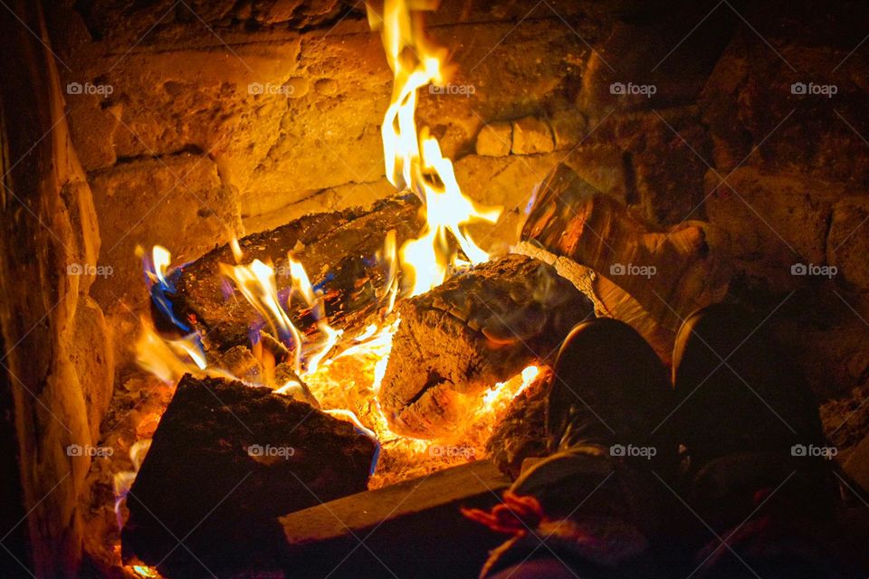 The friendly warm of the fire in winter 